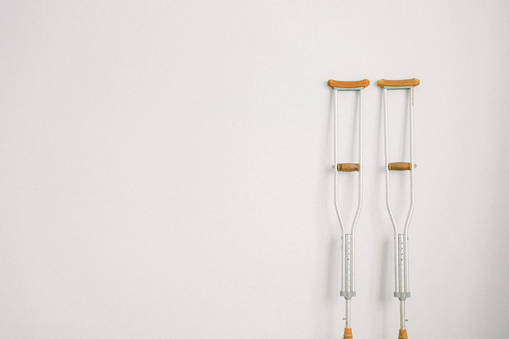 If my employee sustains a work-related injury that was partly caused by his/her own negligence and partly my fault, would the compensation be reduced? If so, how would the percentage or level of such a reduction be determined?