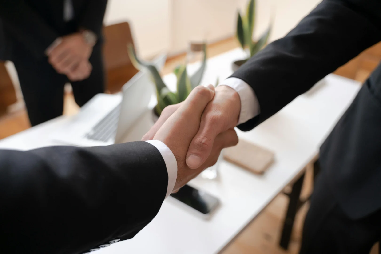 Shareholders Agreement (Three Parties)